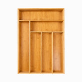 Top view of a bamboo drawer organizer with 6 compartments