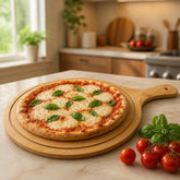 Margherita pizza with basil on a round bamboo pizza board on a kitchen counter