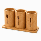 3 empty bamboo utensil cups with spoon, fork and knife cut-outs on a bamboo tray