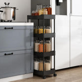 Black 4-tier trolley cart with pantry jars and bottles in a kitchen beside the fridge