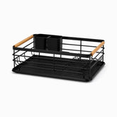 Empty black metal dish rack with bamboo handles, cutlery holder and drip tray