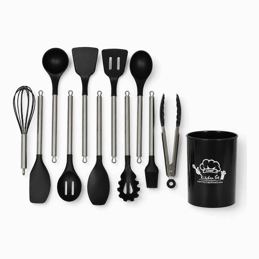 11 black silicone cooking utensils with stainless steel handles laid flat next to their black utensil holder