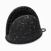 Black silicone mini oven mitt with white speckles, ribbed grip pads and hanging loop