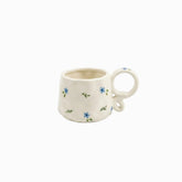 Blue Butterfly Ceramic Mug - cream mug with small blue flowers and curly handle