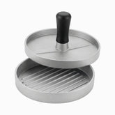 Burger press with black handle and ridged patty base, separated