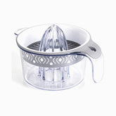 Grey plexi citrus juicer with clear ribbed reamer, white bowl and grey patterned band on a 400ml measuring jug
