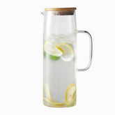 Glass Water Jug with Bamboo & Stainless Steel Lid - filled with lemon water
