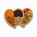 Double heart bamboo serving tray with dried apricots, raisins, almonds, pistachios and coated peanuts