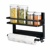 Magnetic rack holding jars of pasta, bay leaves, chickpeas and lentils with a paper towel roll