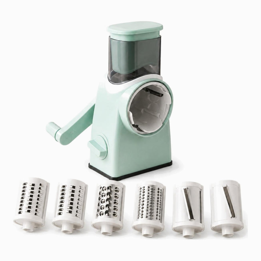 Mint green rotary vegetable slicer with crank handle and 6 drums: 2 shredders, 2 graters and 2 slicers