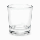 Close-up of a mini clear glass cup with straight sides and thick base