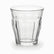 Close-up of a clear paneled tea glass with smooth top band and thick faceted base