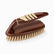 Brown plastic scrub brush with cream rubber grip pads, arched handle and cream bristles