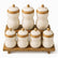 7 cream textured porcelain canisters with bamboo bands and knobs on a 2-tier bamboo rack, 3 tall and 4 short