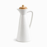 White glossy porcelain oil dispenser 700ml with pouring spout, handle and bamboo lid