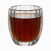 250ml short ribbed double wall glass cup filled with tea