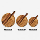 Three round acacia wood serving boards with handles in 45 x 35, 40 x 30 and 35 x 25 cm sizes