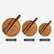 Three round acacia wood serving boards with handles in 45 x 35, 40 x 30 and 35 x 25 cm sizes
