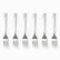 Six stainless steel dessert forks with engraved wave handles lined up in a row