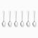 Six mirror-polished stainless steel coffee spoons lined up in a row