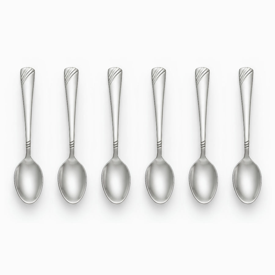 Six stainless steel coffee spoons with engraved wave handles lined up in a row