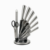 6 stainless steel knives, sharpening steel and black-handled scissors on a round rotating stand