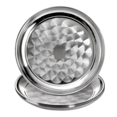 Stack of round stainless steel serving trays with polished swirl base