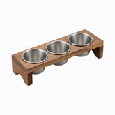 3 stainless steel sauce cups in a dark wooden stand
