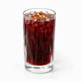 Textured wavy glass tumbler 415ml with thick base filled with jallab and crushed ice