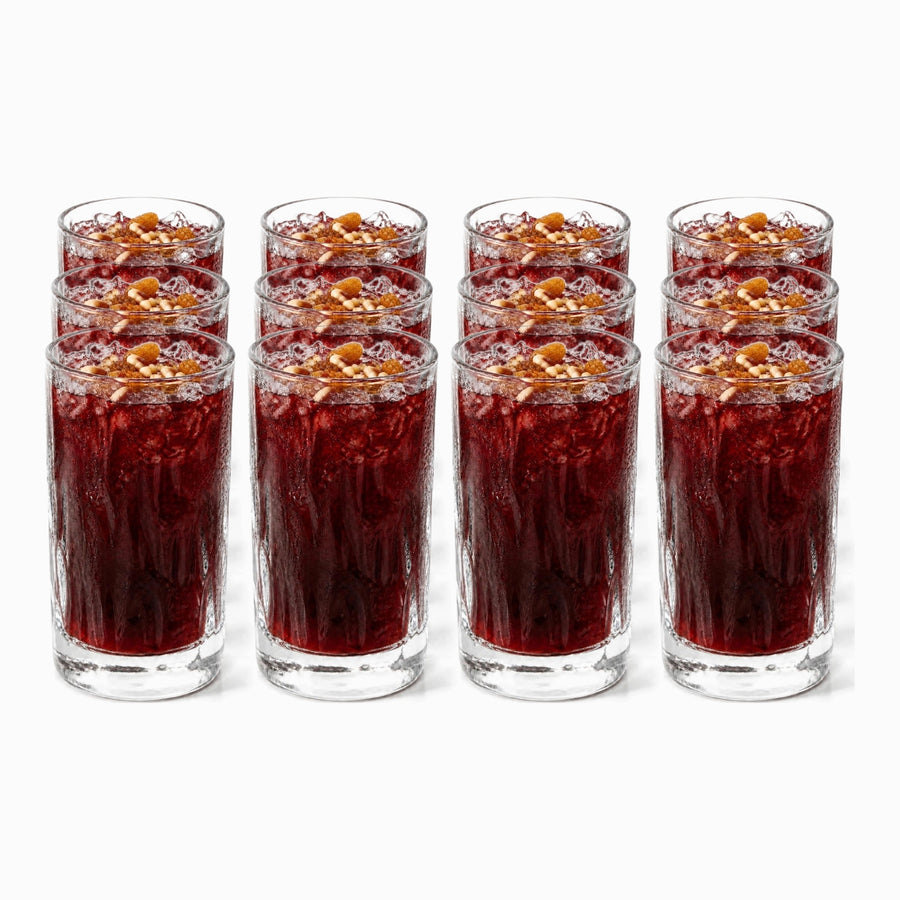Set of 12 textured wavy glass tumblers 415ml filled with jallab, pine nuts and raisins