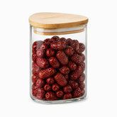 Triangular glass storage jar 900ml with bamboo lid filled with red dates