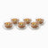 Set of 6 clear hammered glass dessert bowls with wavy saucers filled with meghli and nuts