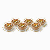 Set of 6 ribbed glass dessert bowls and saucers with gold edges filled with meghli