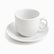 Single empty white porcelain coffee cup with stepped foot and loop handle on a round saucer