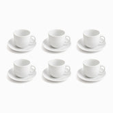 Six empty white porcelain coffee cups on matching saucers in 2 rows