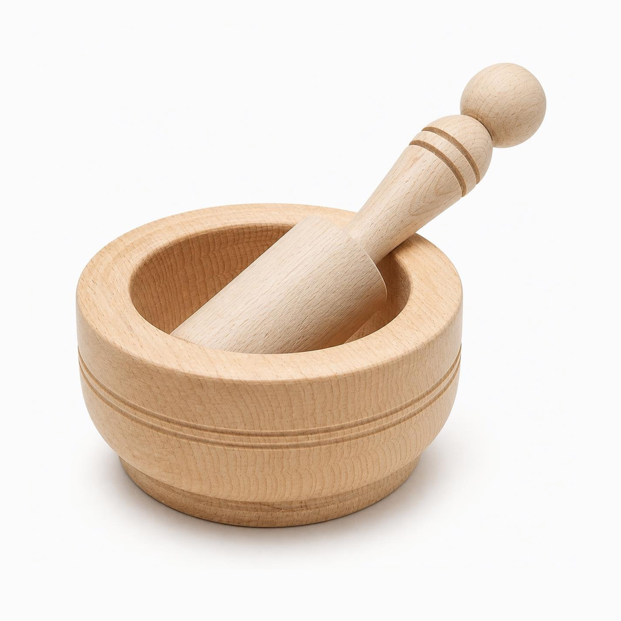 Wooden mortar and pestle set with the pestle resting in the bowl, carved grooves and ball-top handle